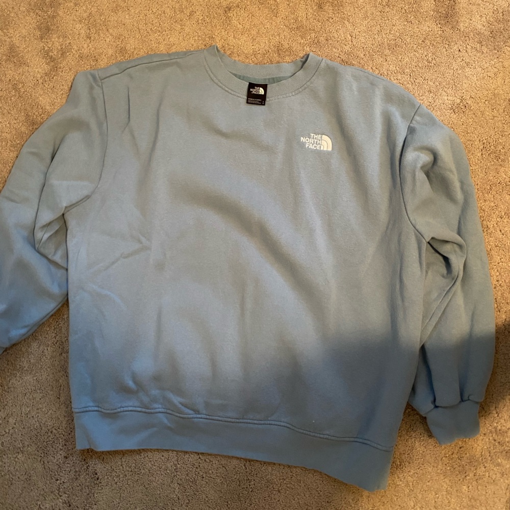 blue north face crewneck